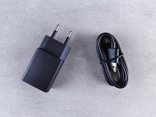 a close up of a power cord and a charger
